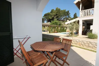 Image de Appartement d'une chambre avec la terrasse Palit, Rab (A-3210-c)