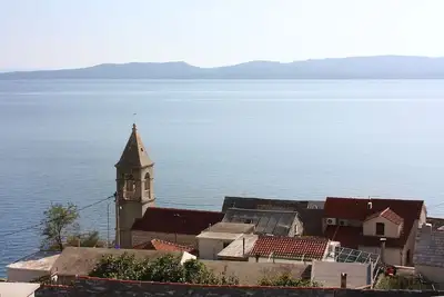 Image de Appartement d'une chambre avec la terrasse et la vue sur le mer Pisak, Omis (A-5154-c)