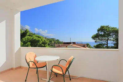 Appartement de deux chambres avec la terrasse et la vue sur le mer Brela, Makarska (A-6688-a)