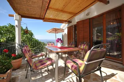 Image de Appartement de deux chambres avec la terrasse et la vue sur le mer Sumpetar, Omis (A-7550-b)