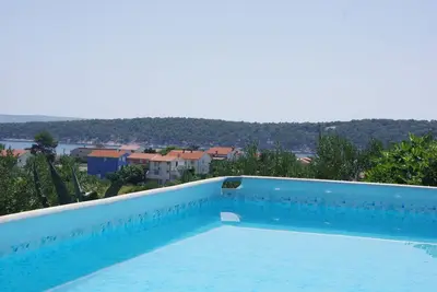 Appartement d'une chambre avec le balcon et la vue sur le mer Barbat, Rab (A-4988-a)