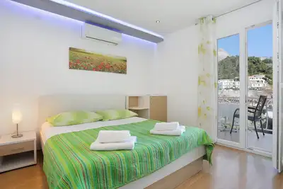 Image de Appartement de deux chambres avec la terrasse Tucepi, Makarska (A-2721-b)