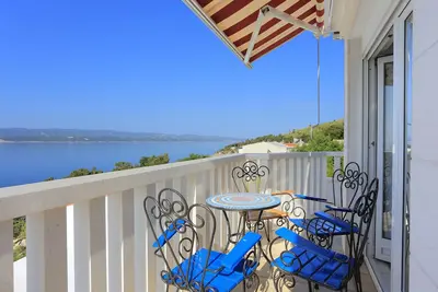 Image de Appartement d'une chambre avec la terrasse et la vue sur le mer Lokva Rogoznica, Omis (A-13226-c)