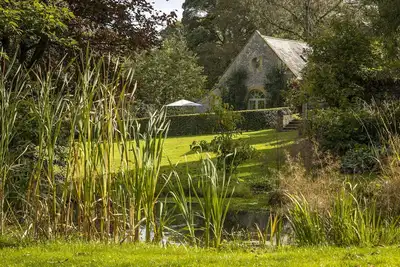 Image de Le Coach House est une propriété individuelle située dans l'enceinte du vieux presbytère du XVIe siècle.