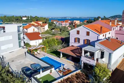Appartement d'une chambre avec la terrasse et la vue sur le mer Preko, Ugljan (A-14163-a)