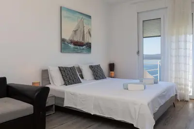 Image de Appartement d'une chambre avec le balcon et la vue sur le mer Lokva Rogoznica, Omis (A-2973-e)