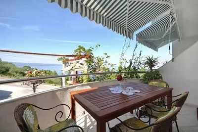 Image de Appartement de deux chambres avec la terrasse et la vue sur le mer Sumpetar, Omis (A-7550-a)