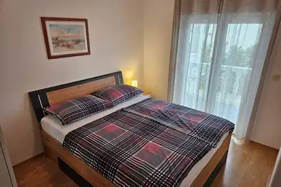 Appartement de deux chambres avec le balcon et la vue sur le mer Barbat, Rab (A-4951-c)