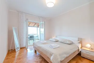 Image de Appartement de deux chambres avec la terrasse et la vue sur le mer Stara Novalja, Pag (A-6319-b)