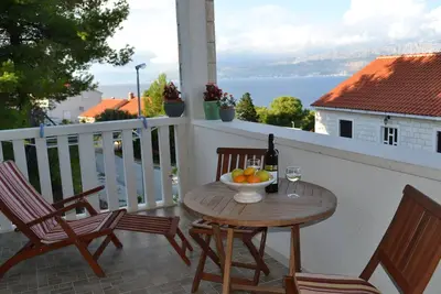 Image de Appartement d'une chambre avec la terrasse et la vue sur le mer Postira, Brac (A-2948-a)
