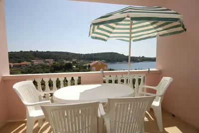 Appartement d'une chambre avec la terrasse et la vue sur le mer Baie Soline, Dugi otok (A-448-d)