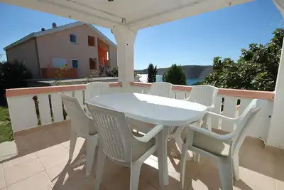Image de Appartement de trois chambres avec la terrasse et la vue sur le mer Vlasici, Pag (A-4319-c)