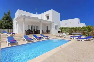 Villa Sagitaro - Au coeur de Cala D’Or à Majorque, comprend une piscine privée
