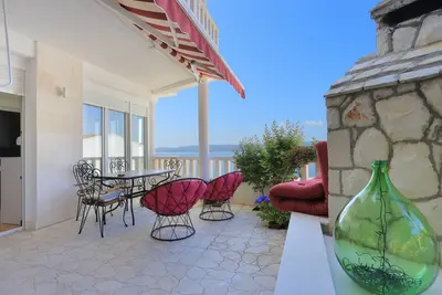 Image de Appartement d'une chambre avec la terrasse et la vue sur le mer Lokva Rogoznica, Omis (A-13226-a)
