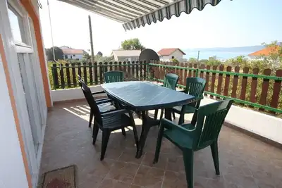 Image de Appartement de trois chambres avec la terrasse et la vue sur le mer Sukosan, Zadar (A-3273-a)