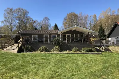 Image de Maison moderne et confortable avec fantastique terrasse près du lac, de la mer et des pistes de ski.
