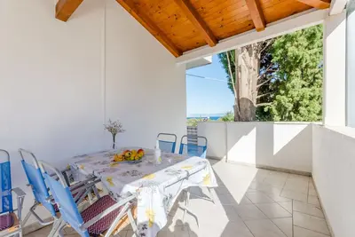 Image de Appartement de trois chambres avec la terrasse et la vue sur le mer Mirca, Brac (A-5613-a)