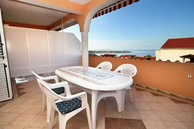 Image de Appartement d'une chambre avec la terrasse et la vue sur le mer Novalja, Pag (A-9334-a)