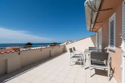 Image de Appartement de deux chambres avec la terrasse et la vue sur le mer Novalja, Pag (A-6317-f)