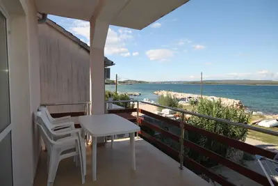Image de Appartement d'une chambre avec la terrasse et la vue sur le mer Kraj, Pasman (A-8247-f)