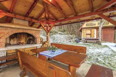 Image de Maison de vacances dans les bois à côté de la rivière