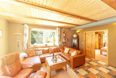 Image de Location Ce - Appartements dans la maison au toit de chaume