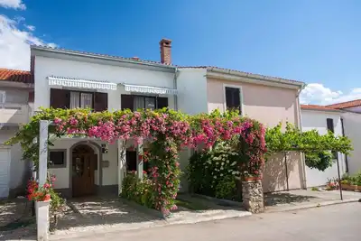 Image de Appartement de vacances avec de l'air conditionné et un accès Internet