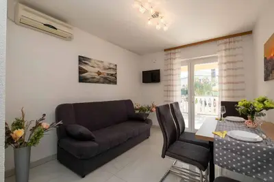 Image de Appartement de vacances avec de l'air conditionné et barbecue près de la plage