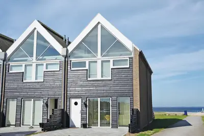Image de Maison de 3 chambres en bord de mer Ă .