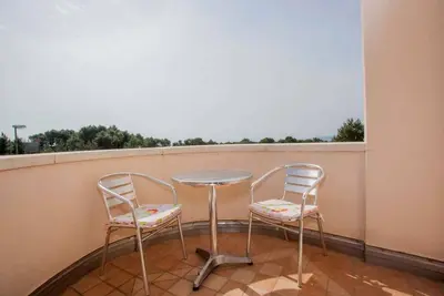 Image de Appartement de vacances avec climatisation et vue sur la mer