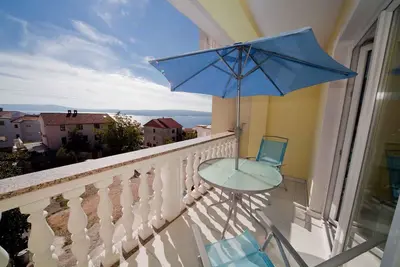 Image de Appartement de vacances avec climatisation et vue sur la mer