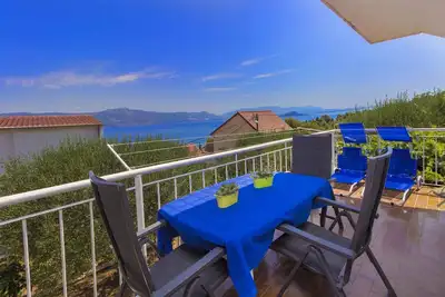 Image de Appartement de vacances avec balcon et vue sur la mer