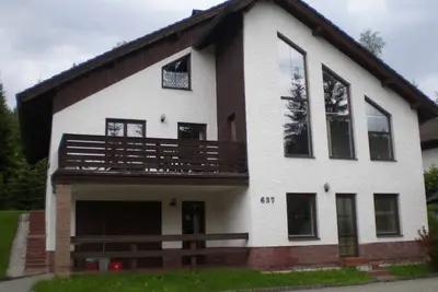 Image de Appartement de vacances avec une entrée privée dans la station de ski