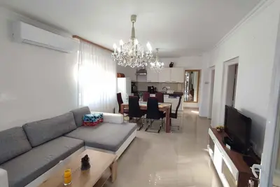 Image de Appartement de vacances avec une vue panoramique sur le lac, près de l'eau