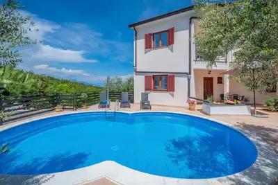 Image de Appartement de vacances avec piscine extérieure, sauna et jacuzzi