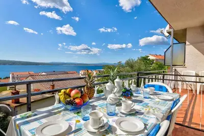 Image de Appartement de vacances avec internet, climatisation et balcon avec vue mer