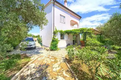 Image de Appartement de vacances avec lave-linge et terrasse avec barbecue