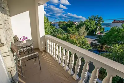 Image de Appartement de vacances avec climatisation et vue sur la mer