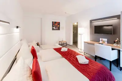 Image de Chambre triple - Hotel Stadtfeld