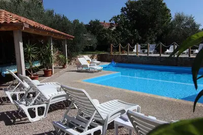 Image de Appartement de vacances avec piscine et vue sur la mer