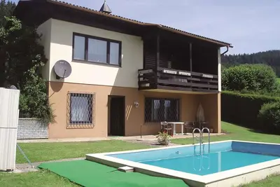 Image de Appartement de vacances avec un grand jardin, barbecue et piscine
