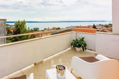 Image de Appartement de vacances avec balcon et vue sur la mer