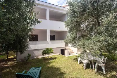 Image de Appartement de vacances avec une terrasse couverte