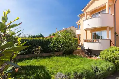 Image de Appartement de vacances avec air conditionné et vue sur la mer