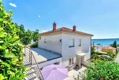 Image de Appartement de vacances avec balcon et vue sur la mer
