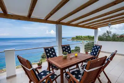 Image de Maison de vacances avec climatisation et vue sur la mer