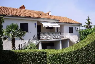 Image de Appartement de vacances avec jardin