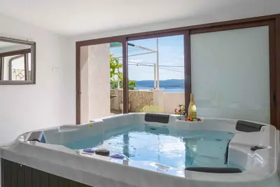Image de Maison de vacances avec sauna et jacuzzi