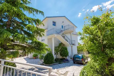 Image de Appartement de vacances avec barbecue, climatisation et Wi-Fi