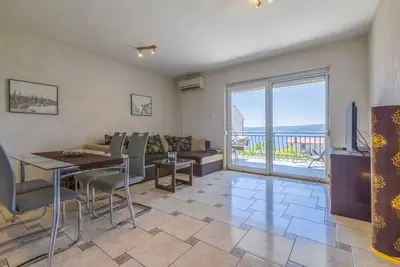 Image de Appartement de vacances avec balcon et vue sur la mer